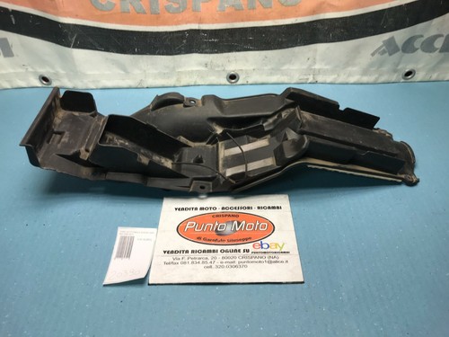 Fairing under seat compartment