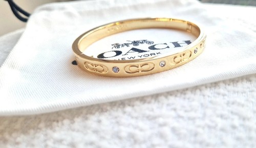 Coach gold toned kissing - kissing, c