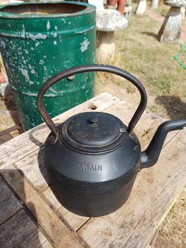 Antique cast iron swain - antique,