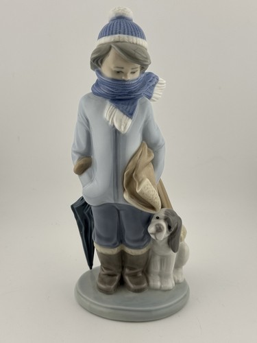 Lladro boy with dog figurine - with,