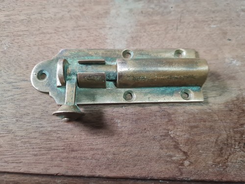 One old vintage bronze bolt - old,