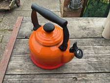 Le Creuset Orange Stove Top