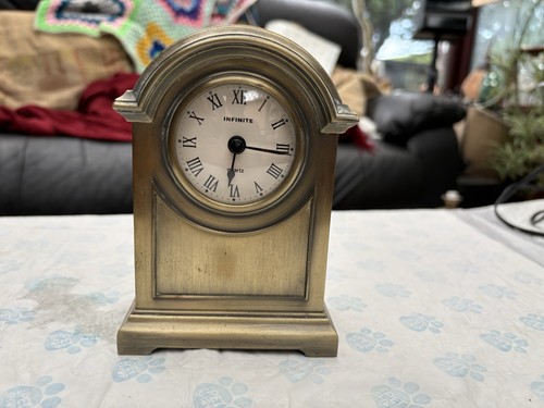 Heavy brass mantlepiece - heavy,