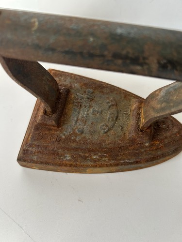 Antique cast iron sad - cast,