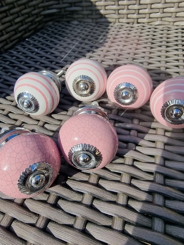 Pink and white knobs hand - 6,