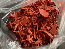 Lot of red plastic toy