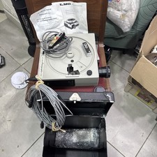 Vintage Elmo Omnigraphic slide projector , case plus manual extra light ,remote 