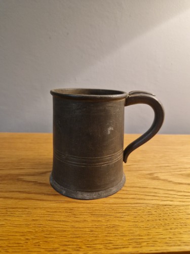 Antique pewter half pint - half,