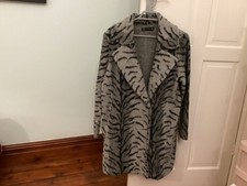 Zara coat size 18 grey/black.New and never worn. Side pockets. Stud fasteners.