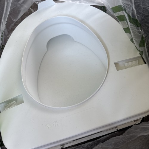 Raised toilet seat with - raised,