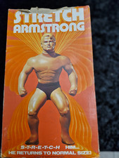 Vintage Stretch Armstrong in original box small repair to hand wear to box