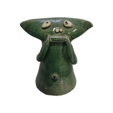 Primitive Studio pottery Green Moneybox Man Playing harmonica  Wattisfield Ware