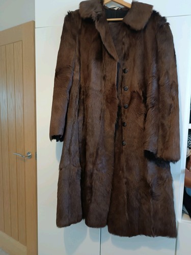 Vintage fur coat likely - “vintage,