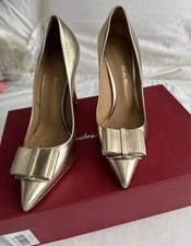 Beautiful Pair Of Salvatore Ferragamo Gold Double Bow Pump Shoe In Calfskin