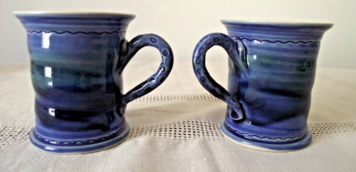 Two scottish studio mugs - scottish,