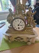 A antique 19thC French Gilt Speiter/marble alabaster figural mantel clock.