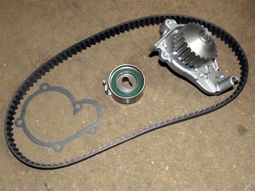 Timing cam belt tensioner - , and