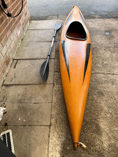 Kayak and paddle - and,