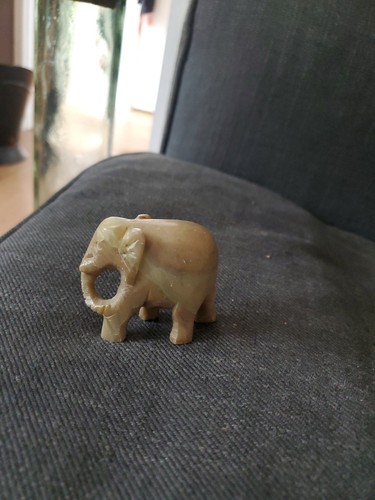 Small hand carved elephant - carved,
