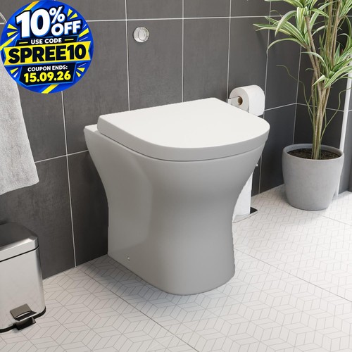 Btw back wall toilet - to,