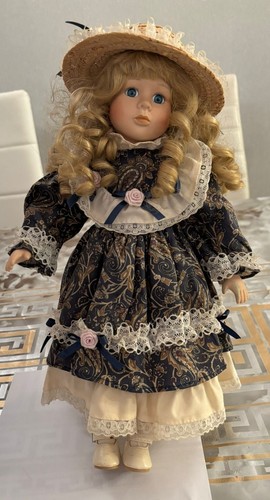 Vintage porcelain doll - ., blonde