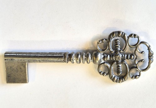 Steel cast key blank filigree