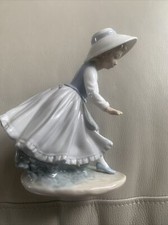 NAO  by Lladro "Girl with Gold Hoop" #0297  No Hoop
