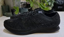 NIKE FLYKNIT RACER TRAINERS