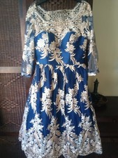 Chi Chi London Size 10 Navy With Gold Lace. Lined And Netted Underskirt.