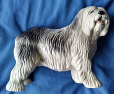 LARGE UNMARKED CHINA FIGURE OF AN OLD ENGLISH SHEEPDOG