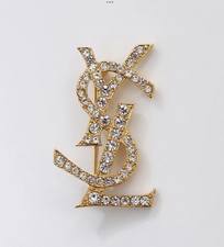 Yves Saint Laurent Saint Laurent pin brooch, badge,