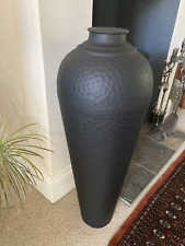 Tall Black Cast Hammered Floor
