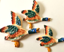 Flying ducks plaster wall