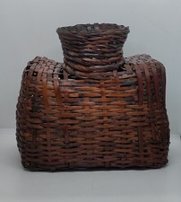 Antique bamboo basket creel is a wicker basket usually used for carrying fish, B
