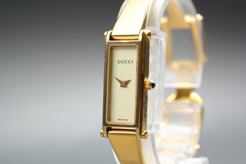 Gucci 1500l gold rectangle - gucci,