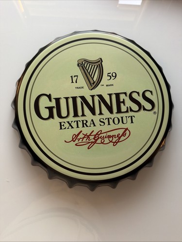 Guinness tin bottle cap - bottle, wall