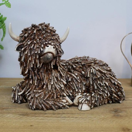 Laying highland cow ornament - laying,
