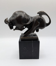 charging bull bronze Miguel