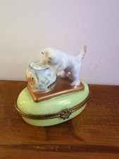 Porcelain Kitten Looking Into