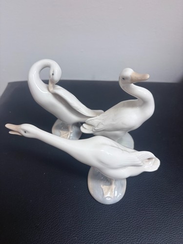 Three lladro geese figurines - three,