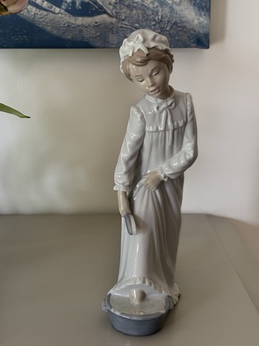Nao lladro figurine - by,