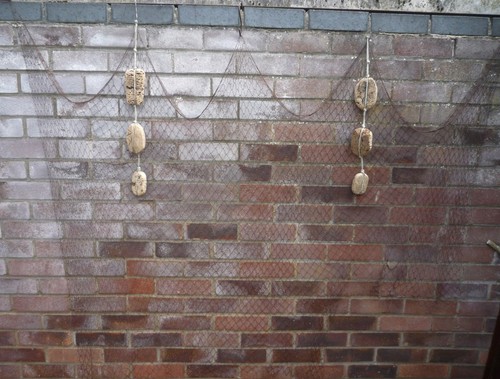 Three vintage cork floats - x,