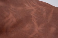 Crazy horse leather in dusty cognac brown color. Pull up , antiqued, full grain