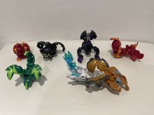 5 x BAKUGAN POP-OUT FIGURES -