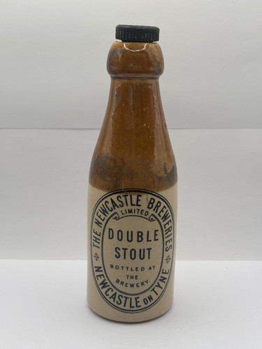 Old stoneware stout bottle