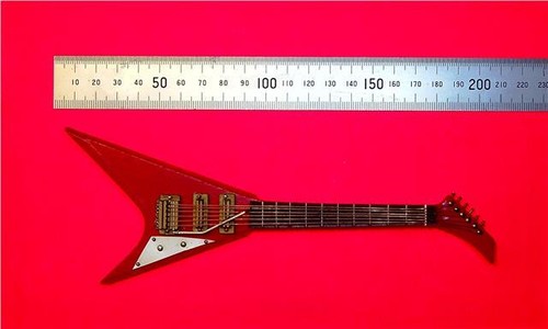 Minature flying guitar in - flying,