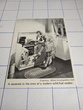 A casserole in the oven of a modern solid fuel cooker kitchen 1960