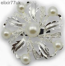 NEW SILVER TONE FLOWER FAUX