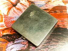 Small square silver tone Coty