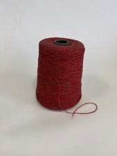 Rust marl yarn on cone for